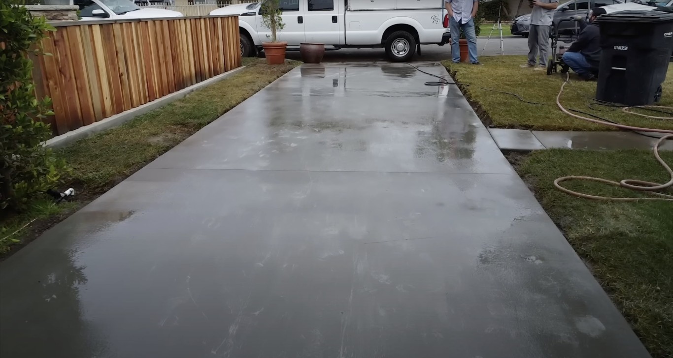 Freshly poured concrete driveway installation in Quincy, MA