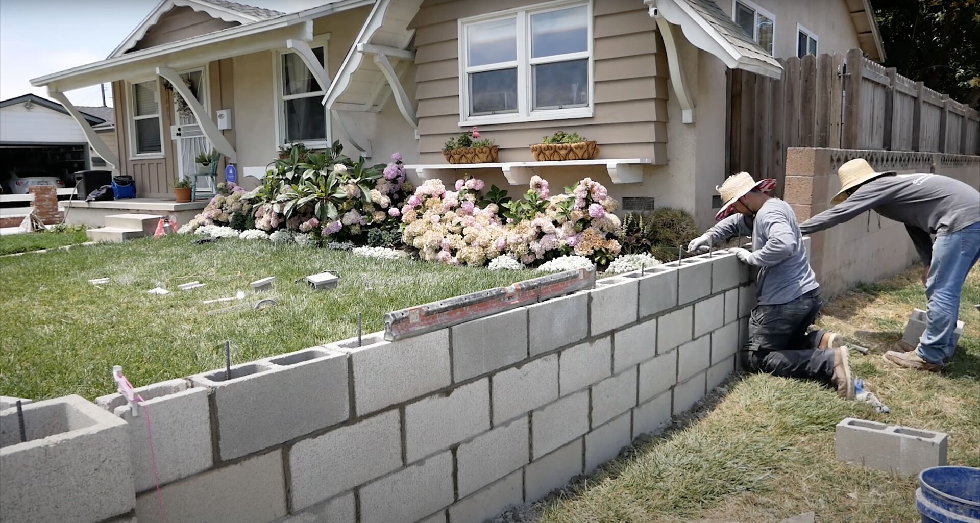 Concrete retaining wall and landscaping services Concrete block wall construction and landscaping